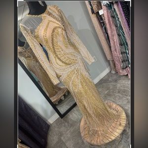 Golden long sleeve evening gown